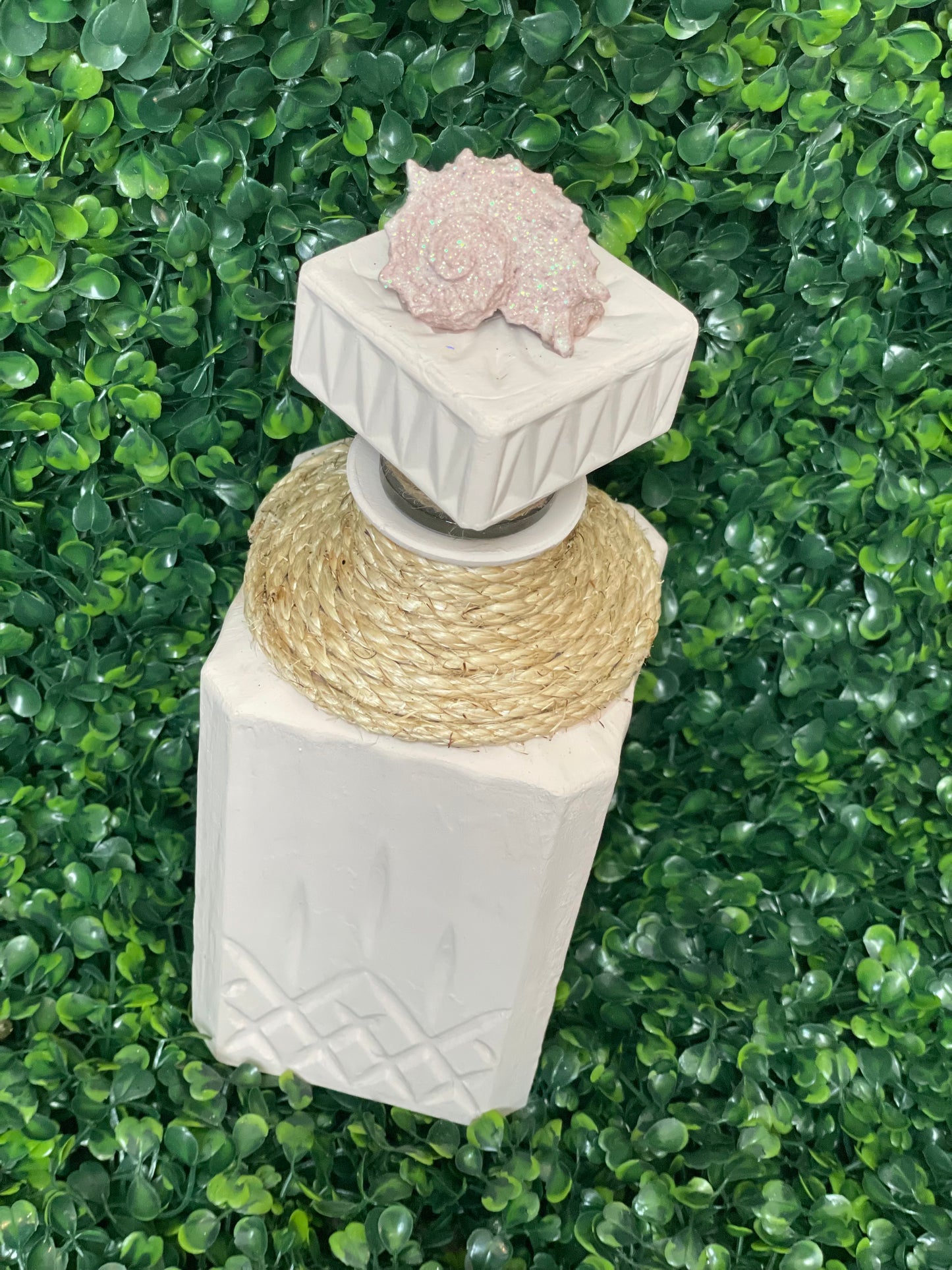 Beige and pink accented Decanter vase decor