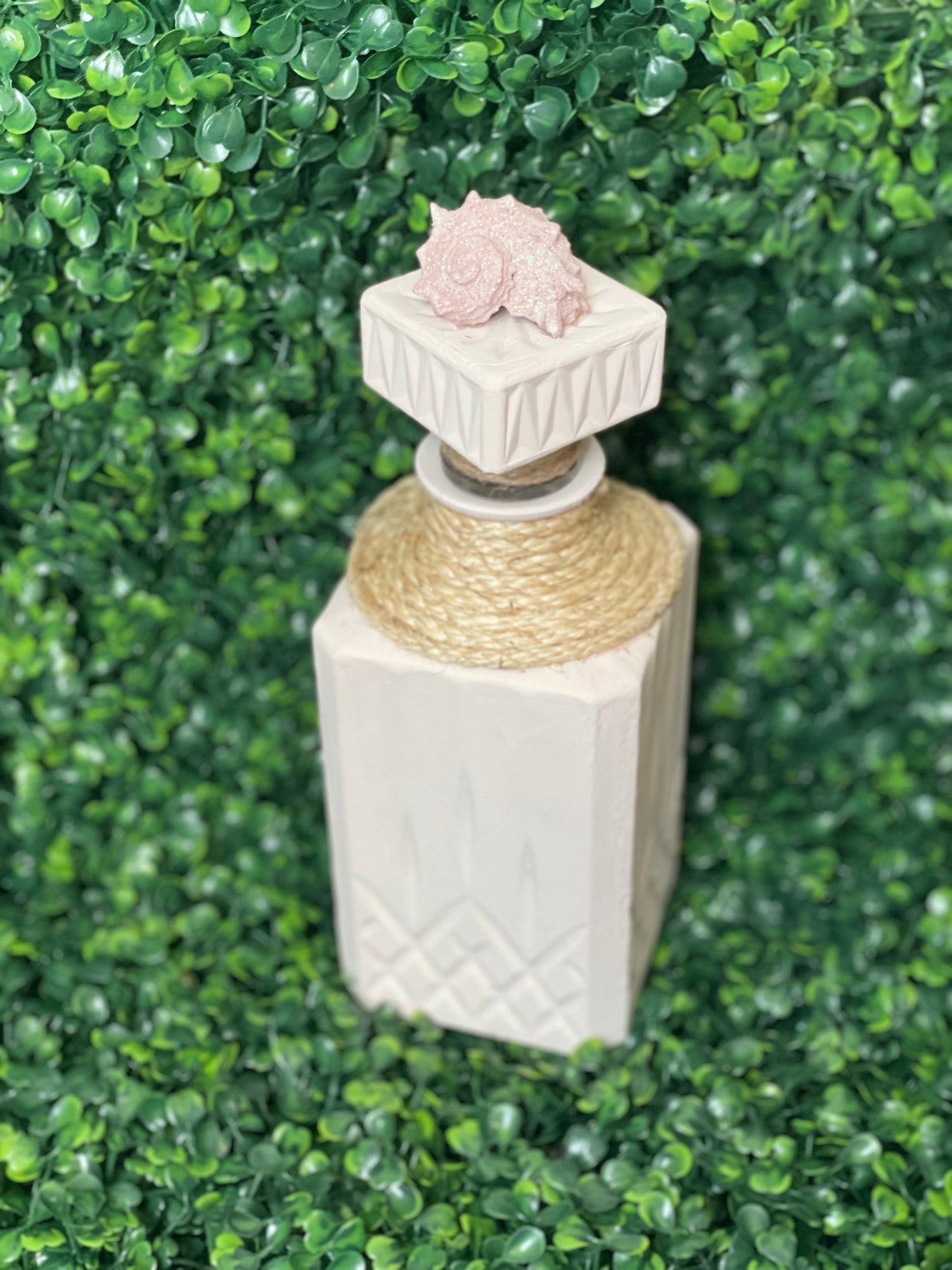 Beige and pink accented Decanter vase decor