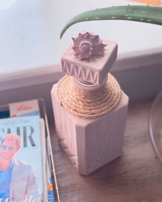 Beige and pink accented Decanter vase decor