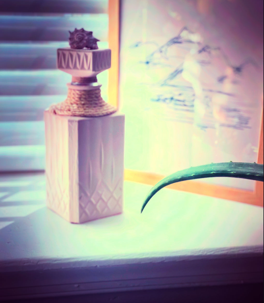 Beige and pink accented Decanter vase decor