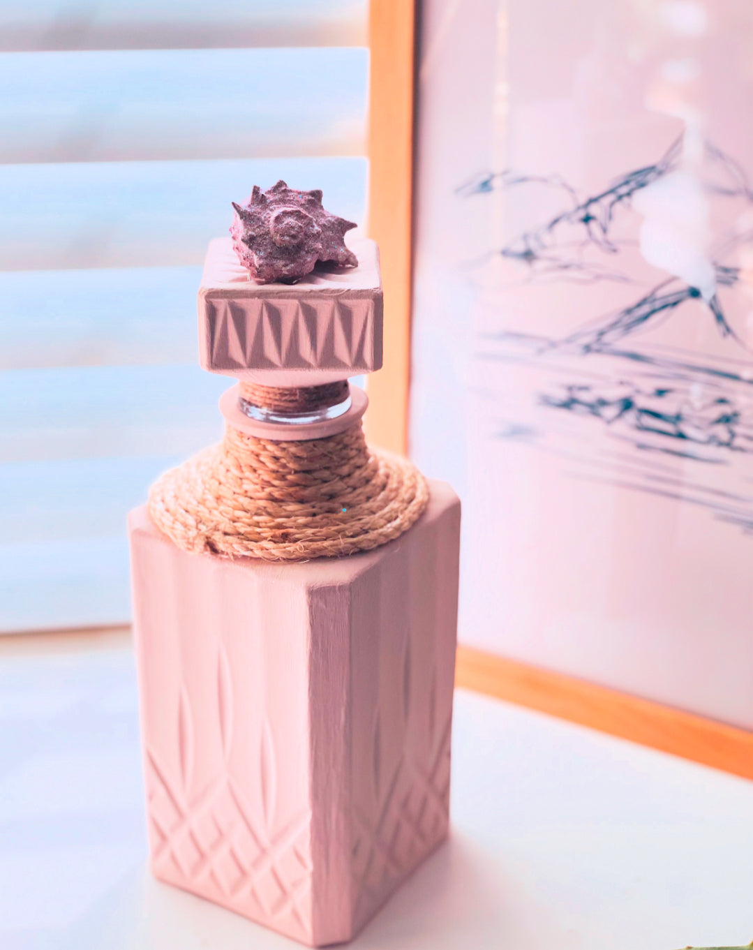 Beige and pink accented Decanter vase decor